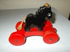 Vintage FOLK ART Small Wooden Horse on Wheels Toy/5