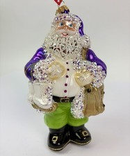 Heartfully Yours Northland Santa Christmas Ornament w/skates Purple Radko 48014 picture