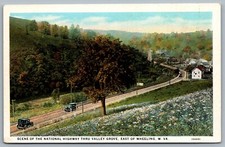 Postcard Wheeling WV c1925 Scene of The National Highway Thru Valley Grove picture