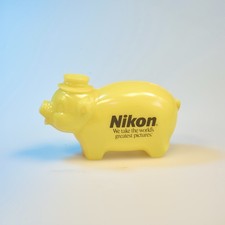 Vintage Nikon Yellow Piggy Bank World’s Greatest Pictures Camera Promo picture
