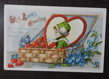 Antique Valentine Postcard: Child in Basket of Hearts Embossed Clapsaddle picture
