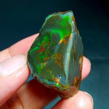 114ct Natural Ethiopian Welo Opal Rough – Intense Green & Red Fire Specimen picture