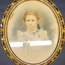 Hand-Tinted Sepia Woman Portrait Photograph in Ornate Oval Framed Portrait picture