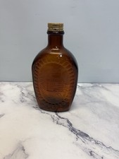 VTG 1976 Americana Log Cabin Syrup Bicentennial Amber Bottle (cabin/flag) picture