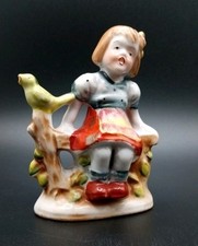 Vintage Made In Occupied Japan Porcelain Figurine Girl on Fence with Bird picture