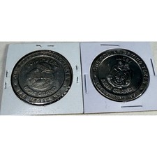1993 MGM Grand Las Vegas One Dollar Gaming Tokens Boyd the Bird Lucey Set of 2 picture