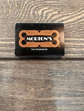 Morton's The Steakhouse Vintage Art Deco Logo Black Copper Matchbook picture