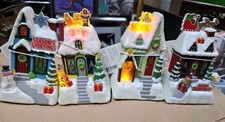 Working 2009 Hallmark Caroling Cottages Christmas Village Set of 4 Working W/tag picture