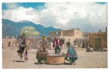 Taos Pueblo New Mexico c1950's Native American Dancers, drum, adobe buildings picture