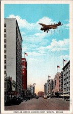 Wichita Kansas 1930 Douglas Ave Airplane Dropping Objects Streetcar Postcard picture