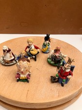 six metal thimbles, each a different nursary rhyme most with moving parts picture