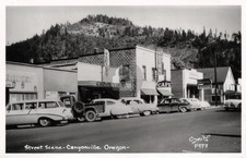 Canyonville OR Oregon Street Scene Hotel Cafe Market c1950s RPPC Postcard COPY picture