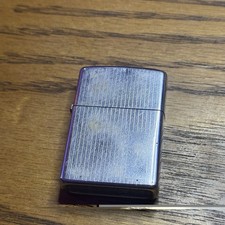 Vintage 1976 Zippo Lighter Chrome Vertical Line Pattern Brushed Silver picture