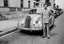 Senator Huey P Long standing by an automobile ca 1935 Historic Old Photo picture