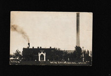 Vtg 1914 RPPC New Baltimore MI - DUR Building Smokestacks Archway RAPTO picture