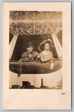 c1915 RPPC COUPLE IN AIRSHIP STUDIO FANTASY POSE/DIRIGIBLE picture