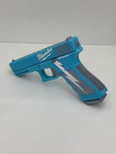 3D Printed Pistol Shaped Fridge Magnet 2 Halves Blue Gray PLA Decoration picture