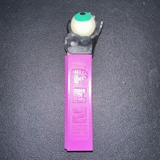 Vintage 1967 Pez Psychedelic Eye Dispenser Black Hand Purple Stem Free S&H In US picture