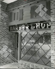 1962 Exterior of a small town barber shop picture