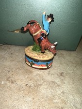 Ceramic Trinket Box Bull rider With Baby Bull. picture