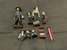 9 Pc Lot Vintage Cast Iron Amish figurines. nice picture