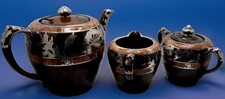 Beautiful  Brown Porcelain Pot Creamer And Sugar Set With  Silver Overlay picture