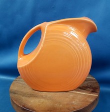 VTG Fiesta HLC USA Tangerine Orange Art Deco Disc Pitcher picture