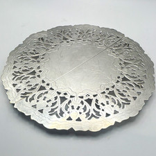 Foldable Expandable Round Silver Tone Metal Trivet w/ Pierced Floral Design picture