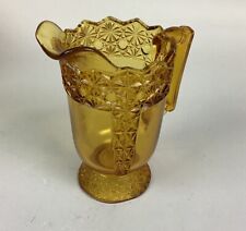 Vintage McKee Queen Daisy & Buttons Amber Glass Footed Pitcher - 8 1/4” picture