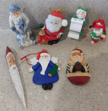 Lot Of 7 Christmas Themed Santa Claus Hanging Ornaments picture