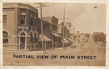 H47/ Tripoli Iowa RPPC Postcard c1910 Main Street Stores Bank Automobile picture