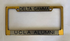 VINTAGE HEAVY METAL UCLA DELTA GAMMA SORORITY LICENSE PLATE FRAME picture