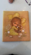 Vintage 1970s Hallmark photo album or scrapbook cover featuring retro girl picture