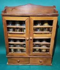 Vtg MidCentury 2 Door Spindle, 2 Drawer Spice Rack with 12 Lidded Glass Bottles picture