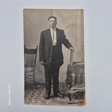 Antique RPPC Young Man in Suit Holding Booklet Studio Portrait AZO c1910 picture