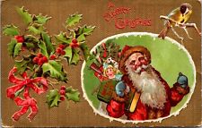Christmas Postcard Santa Claus Carrying a Bag Full of Toys Holly Bird picture
