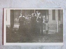 Vintage 1907-20s RPPC Postcard: Family Portrait, House, Porch in Background picture