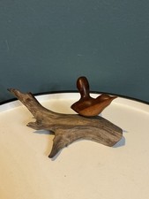 Sleek mid-century carved wood bird on branch picture