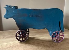 Vintage Folk Art Blu Cow Wood Pull Toy Metal Wheels Signed Hoover Primitive picture