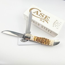 Case xx 30093 Folding Hunter Jigged Amber Bone Carbon Steel Pocket Knife picture