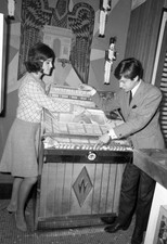 Sheila singer Akim next to a Wurlitzer jukebox in Paris on October- Old Photo 2 picture