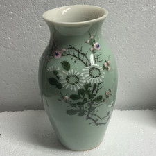 Antique Japanese Seto porcelain vase featuring a light green celadon glaze picture