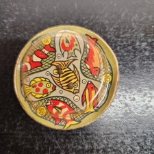 Vintage Milk Cap Fish Puzzle Game