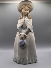 NAO by Lladro Charming girl with straw hat figurine - 11 ½