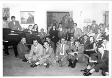 Group of people taking photo with Christmas tree in background Found Photo V0755 picture