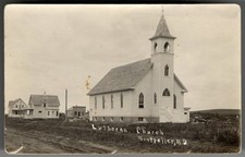 USA MONTPELIER ND 1910s Street View Lutheran Church. Real Photo Postcard picture
