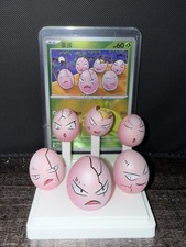 Exeggcute 102/151 CN Card & Pokemon Figure, Includes Display Stand for card. picture