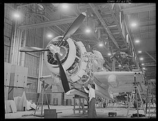 Photo:1930s-1940s Aircraft Factory Assembly Line Workers on Airplane picture