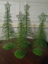Pier 1 Imports Christmas Trees Set of 4 Green Glitter Looped Wire. Sparkly picture
