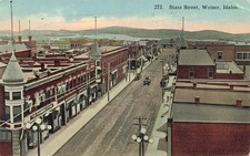 1916 IDAHO POSTCARD: STREET VIEW OF STORES ON STATE STREET, WEISER, ID picture